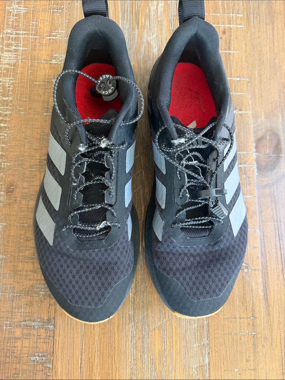 adidas Black Sneakers with Gray Stripes and Red Insoles